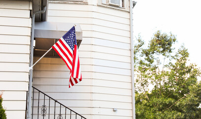 US flag proudly displayed at home symbolizes patriotism, pride, and independence