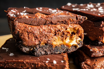 Caramel Chocolate Cheesecake Dessert Bars with Ganache Topping: Layers of chocolate crust, caramel, cheesecake filling, and dark chocolate ganache