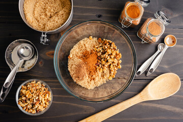 Making Filling for Hotteok Sweet Korean Pancakes: Brown sugar, cinnamon, nutmeg, and walnuts in a...