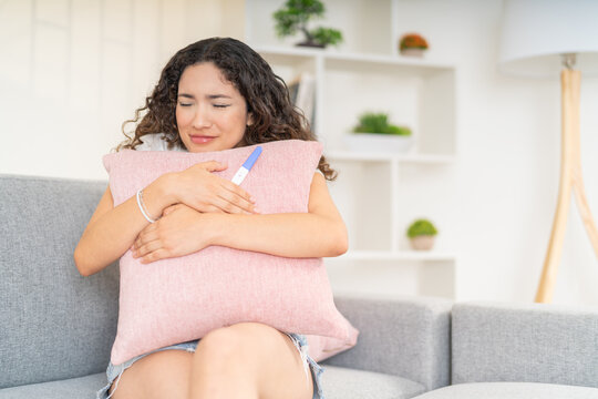 Impatient Woman Waiting For The Results Of A Pregnancy Test