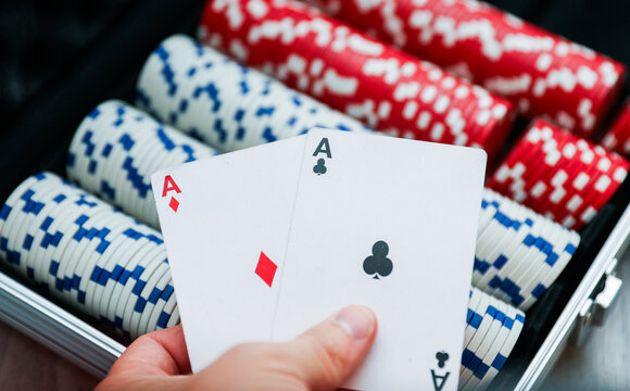 playing cards on a green felt table, capturing the excitement and allure of casino gambling