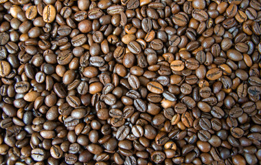 Roasted coffee beans background.