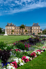 Fototapeta na wymiar Paris, France - August 10, 2023: Luxembourg Palace and flowering park, Seat of the French Senate