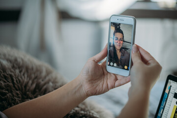 The girl is broadcasting live from the phone. Close-up of hands