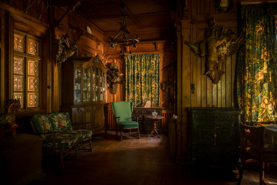 19th 20th century hotel central room with hunter trophy