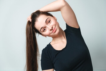 Fototapeta premium Portrait of beautiful smiling 30 years woman with long hair isolated on white background closeup. Copy space. Banner. Pretty girl face. Looking at camera. White skin and big eyes. European appearance