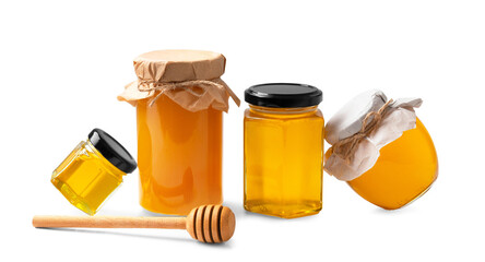 Banks with honey one near the other on a white background.