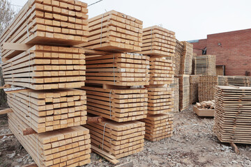 Pallets for building materials.Wooden stands for transportation of building materials. Wooden pallets are stacked.