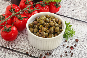 Marinated green capers in the bowl