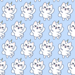 Seamless pattern of white kawaii cats on a blue background