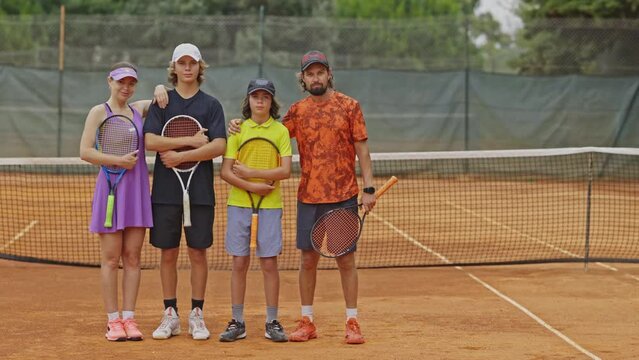 Family portrait of tennis players 