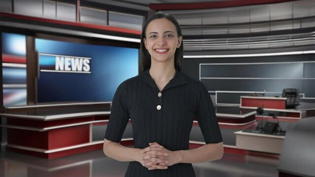 Happy Indian female news anchor smiling
