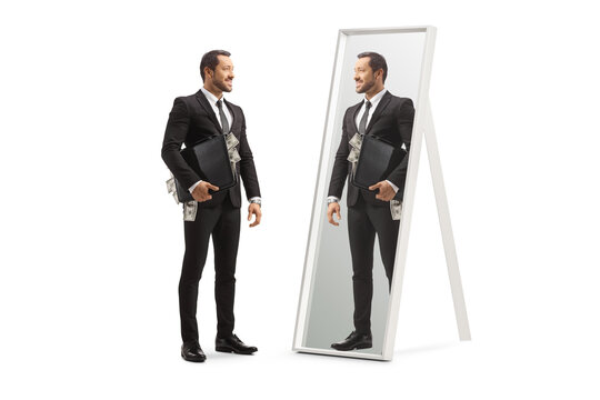 Full length shot of a businessman standing with a briefcase full of money and looking at a mirror - Powered by Adobe