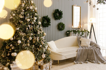 Beautiful holiday decorated room with Christmas tree and bright lights