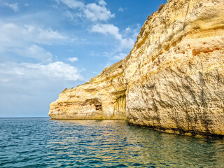 Fototapeta na wymiar Cliffs and caves in Benagil, Algarve, Portugal