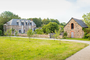 The buildings located in Beauport Abbey gardens, a gothic building located in Paimpol, Cotes d'Armor, Brittany, France. August 2023, sunset view.