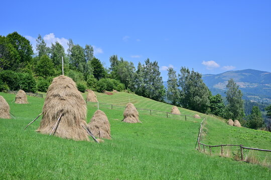 Haystacks at mountain, during summer time