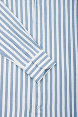 Striped men's shirt. Sleeve close up.