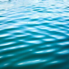 Naklejka premium Blue green water. Ripples. Reflection of light. Little waves. Gradient. Dark teal color sea surface. Background with space for design.