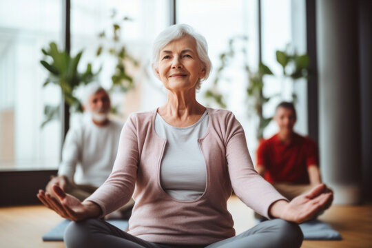 A peaceful image capturing seniors engaged in chair yoga, demonstrating seated balance exercises like knee lifts and ankle circles to enhance stability and prevent falls.