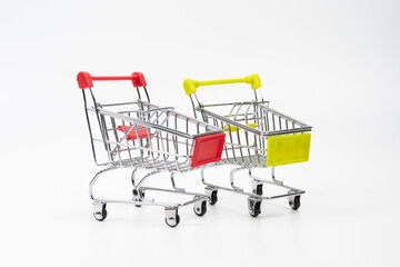 Two empty shopping carts isolated on white background