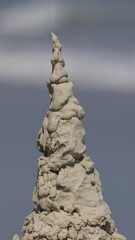 Fototapeta premium Beach sand in shape of Christmas tree. 