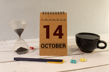 October 14 calendar date text on wooden blocks with copy space for ideas or text. Copy space and...