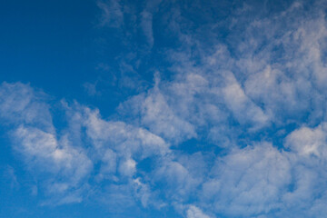 clear blue sky with white clouds
