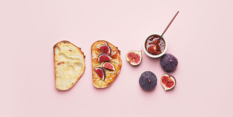 Tasty sandwiches with sweet fig jam on pink background, top view