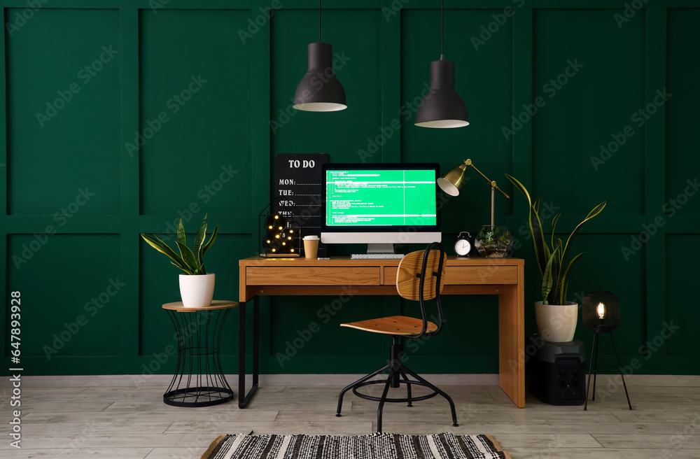 Wall mural Interior of office with programmer's workplace and houseplants