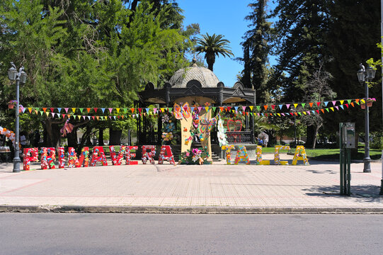 View of letters "Primavera Talca" (="spring Talca" in spanish) at the entrance of Plaza de Armas park in a small south american town (Talca, Chile)