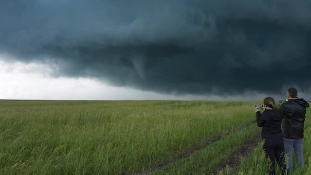Storm Chaser Adventure Tourists Watch As Tornado Begins To From Close By