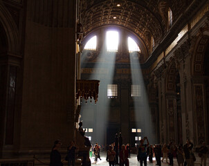 rays of light going through st peter church vatican window