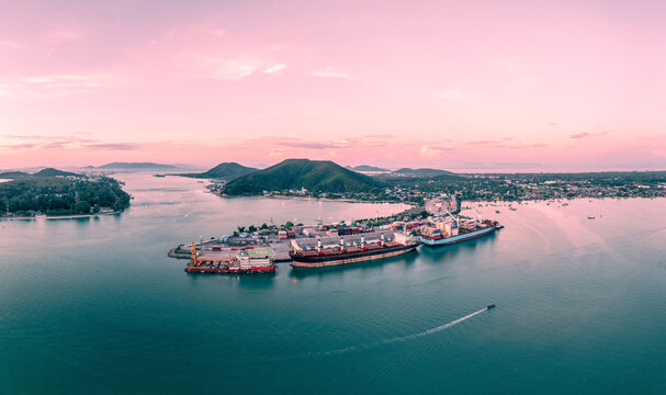 Panarama and seascape of Songkhla cargo ships at twilight sky. Ancient town at Hua Khao, Singhanakhon, Songkhla, Thailand