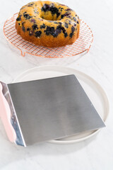 Lemon blueberry bundt cake with powdered sugar dusting