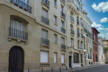 Paris, typical building Art deco rue Cassini in the 14th arrondissement, beautiful facade
