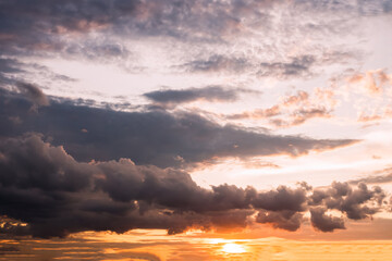 Panoramic view of sunset golden and blue sky nature background.
Colorful dramatic sky with cloud at sunset.Sky background.Sky with clouds at sunset.