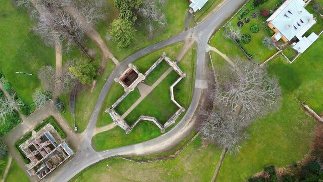 Port Arthur, Tasmania: Top down aerial drone footage of the Port Arthur historic site and penal settlement in Tasmania in Australia. Shot with a rotation motion