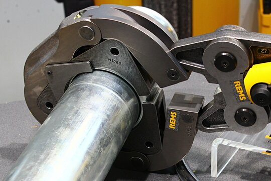 Head detail of radial press used for pipe connecting by pressure, possibly Akku-Press model series, displayed by german manufacturer REMS on Aqua Term expo in Nitra, Slovakia. 