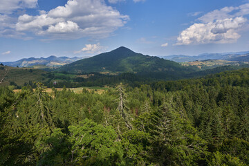 Fototapeta premium Mountains covered in forests