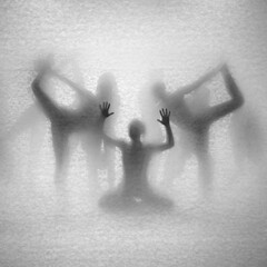 Abstract composition of dancing girls. Theater of shadows through the light with a vintage texture.