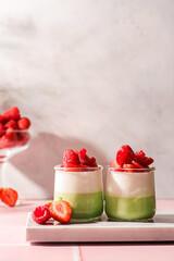 panna cotta with matcha and raspberries