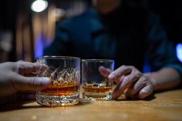 Barman pouring whiskey whiskey glass beautiful night