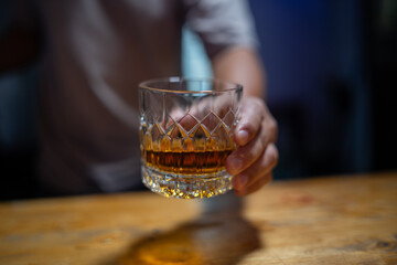 Barman pouring whiskey whiskey glass beautiful night