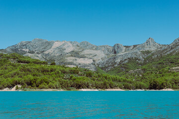 Mountain landscape, picturesque mountain lake on a summer morning, large panorama, Spain, Guadalest