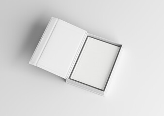 White plain empty blank hardcover book inside magnetic cardboard paper gift box on isolated background 