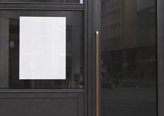 white plain empty blank vertical branding outdoor advertising poster on black glass window of cafe...