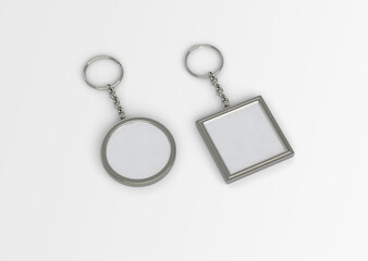 white plain empty blank square round rounded metallic steel key ring chain with isolated background