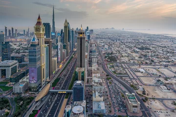 Foto op Canvas This view looks southbound, past the Dubai International Finance Centre and Burj Khalifa towards the Burj Al Arab and Dubai Marina. © Richard Brew