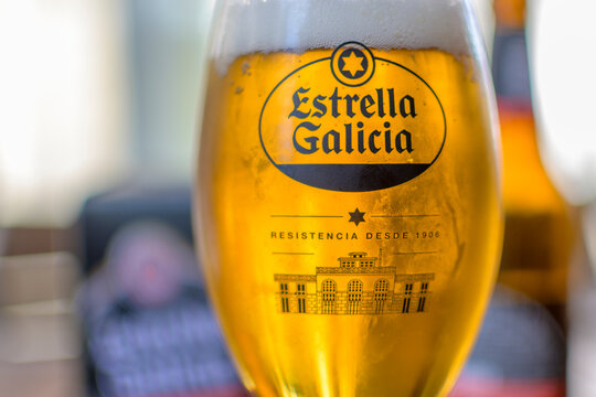Estrella Galicia beer glass closeup shot